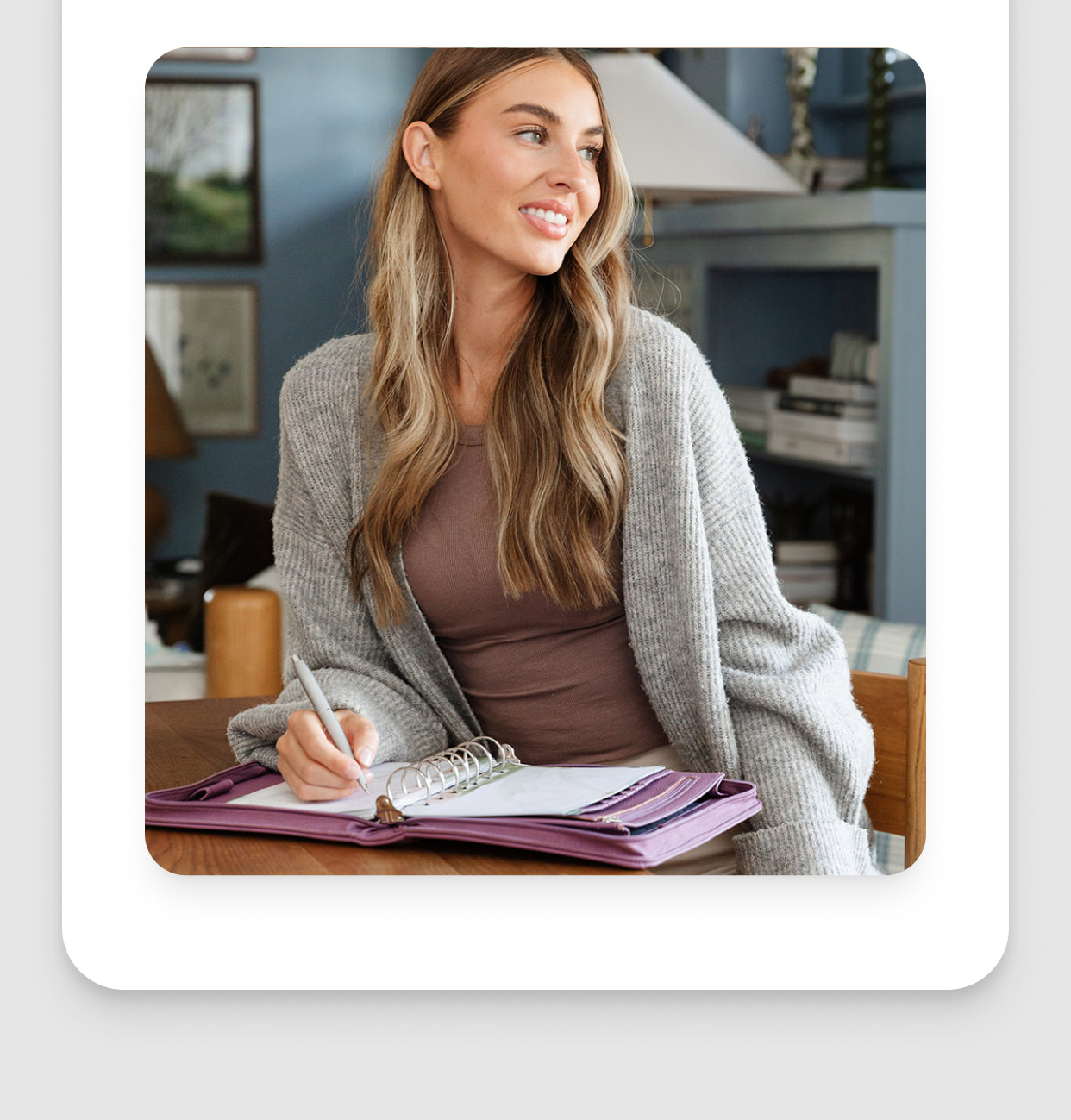 Picture of woman and her planner.